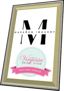 Professional Photographer A framed sign displays the Marañon Imagery logo above a round badge that reads “The Greater Virginia Bridal Show—Featured Wedding Photography Vendor” in teal and pink. www.maranonimagery.com